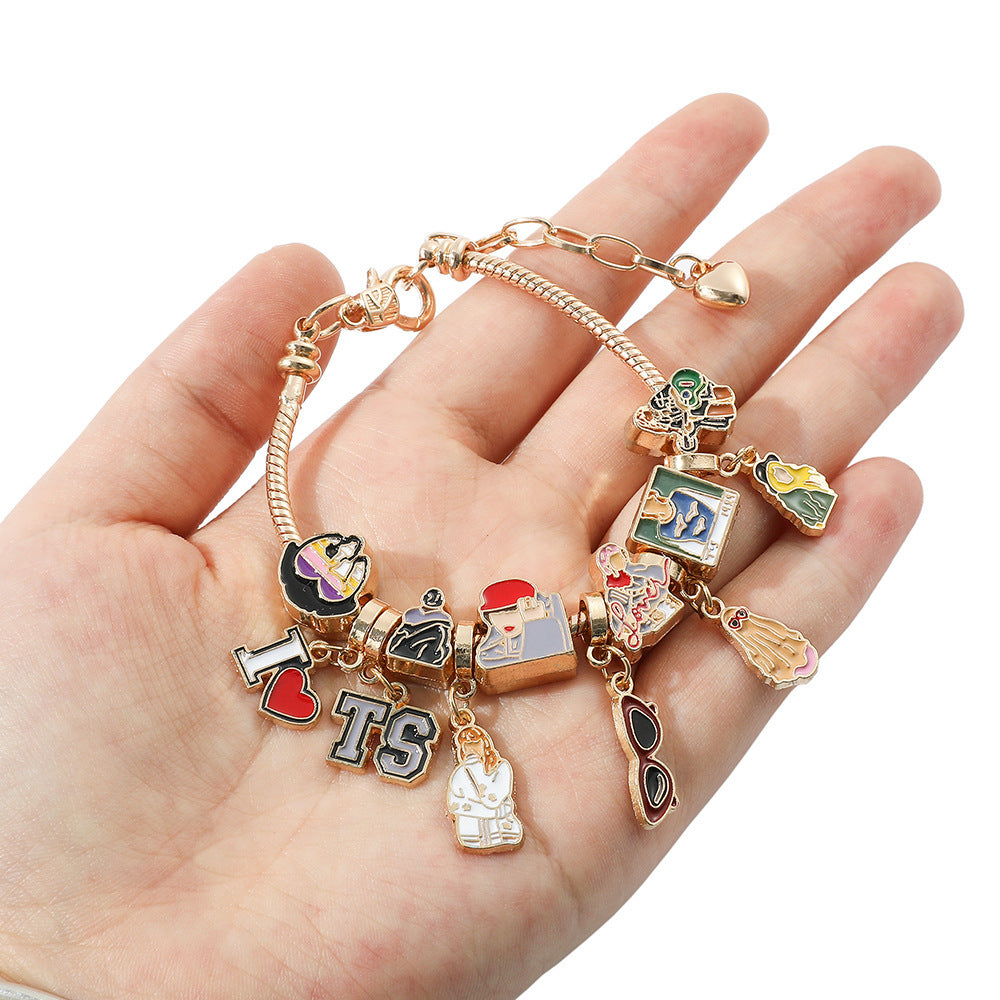 Charm bracelet held in hand to show size